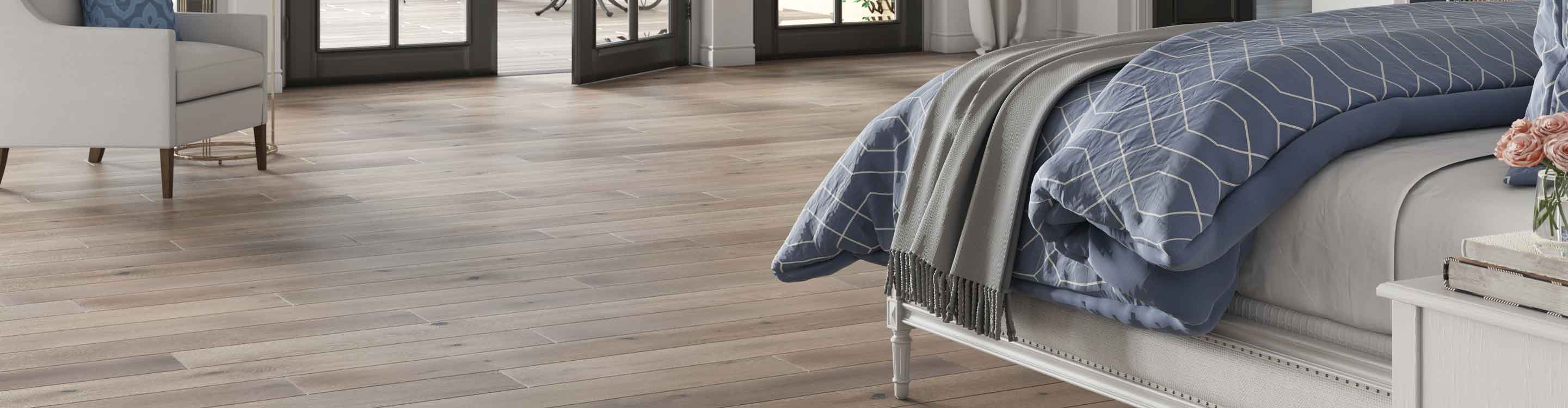 hardwood in a bedroom with a fireplace