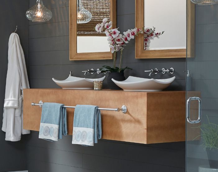 Sinks in a designer bathroom at Dons Carpet One