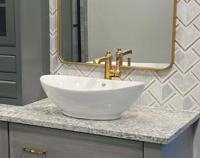 Sinks in a designer bathroom at Dons Carpet One